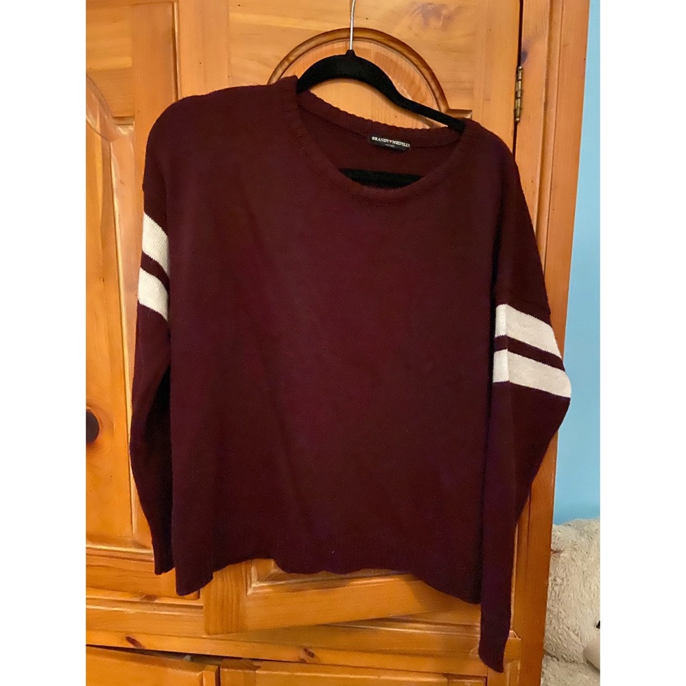 Maroon sweater with white stripes